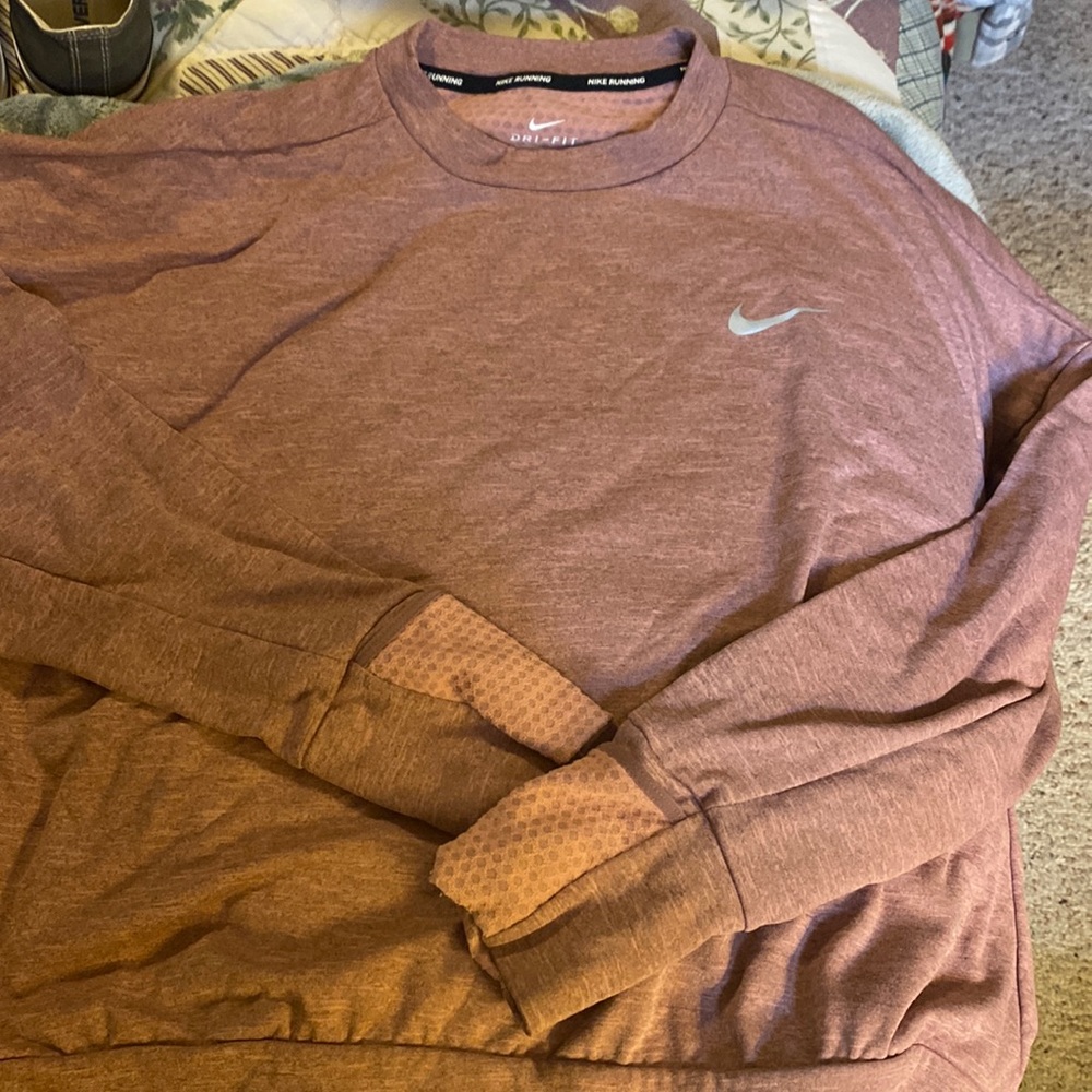Nike running shirt.